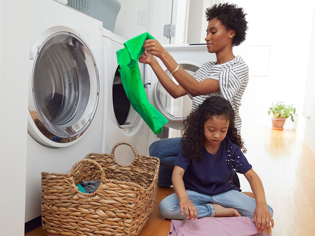 mother+and+daughter+folding+laundry